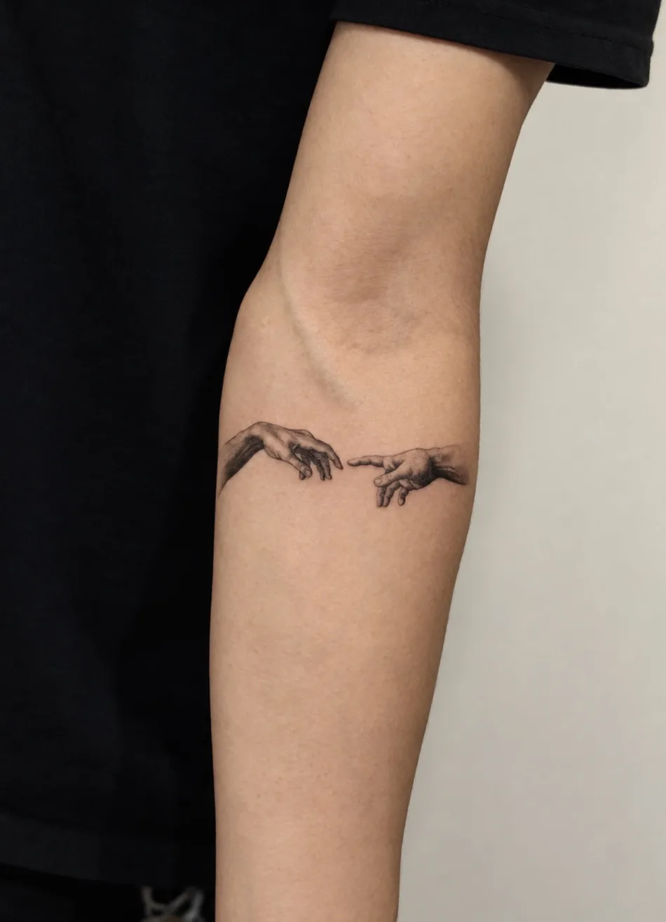 Fine line hand tattoo by Christian Cruz